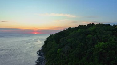 aerial view beautiful sunset above Kala island at Layan beach Phuket.colorful sky of sunset at horizon.Phuket beach sea Amazing beach, Beautiful beach Phuket Thailand, Nature and travel concept.