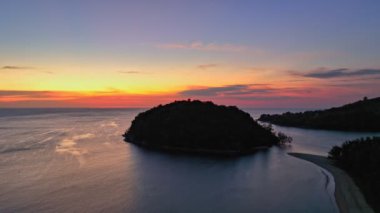 aerial view beautiful sunset above Kala island at Layan beach Phuket.colorful sky of sunset at horizon.Phuket beach sea Amazing beach, Beautiful beach Phuket Thailand, Nature and travel concept.