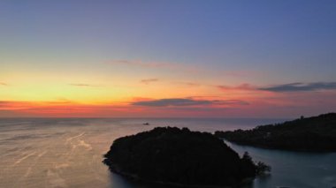 aerial view beautiful sunset above Kala island at Layan beach Phuket.colorful sky of sunset at horizon.Phuket beach sea Amazing beach, Beautiful beach Phuket Thailand, Nature and travel concept.