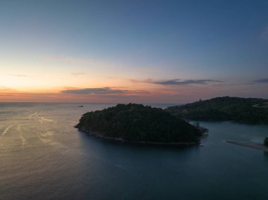 aerial view beautiful sunset above Kala island at Layan beach Phuket.colorful sky of sunset at horizon.Phuket beach sea Amazing beach, Beautiful beach Phuket Thailand, Nature and travel concept.