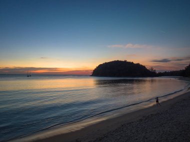 aerial view beautiful sunset above Kala island at Layan beach Phuket.colorful sky of sunset at horizon.Phuket beach sea Amazing beach, Beautiful beach Phuket Thailand, Nature and travel concept.