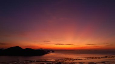 Aerial view of Laem Had Beach in Koh Yao Yai, island in the andaman sea between Phuket and Krabi Thailand.Aerial view stunning sky at sunrise above coconut trees.Landscape with tropical.