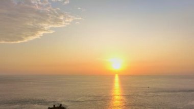 aerial view sky in sunset at Promthep capePromthep cape is the most popular and famous viewpoint in Phuket island.the most tourist always come to see sunset. 