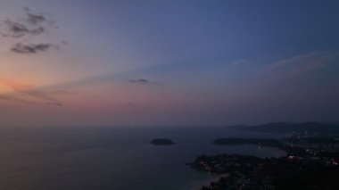 aerial panorama view beautiful sky over the sea at three beaches viewpoint..popular landmark to see three beaches..Kata Noi beach, Kata beach and Karon beach..golden sunset background.aerial panorama 
