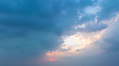 aerial hyper lapse view Clouds cover the sky..The sun shines through the clouds in the evening..white cloud in blue sky background..4K video for Nature and travel concept.