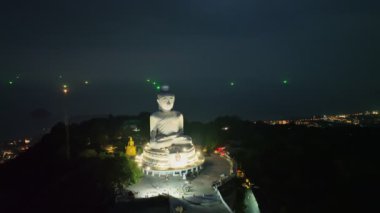 .aerial night view beautiful lighting around the Phuket island.  .Twinkling lights along the beach and in various towns around Phuket Island. .creative nature and travel concept.lighting background..