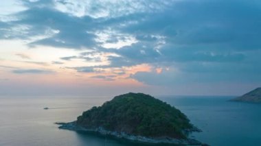 aerial hyperlapse view sunset at Laem Promthep Cape..Promthep cape viewpoint is the most popular viewpoint in Phuket island..time lapse day to night 4K video of Majestic sunset landscape..