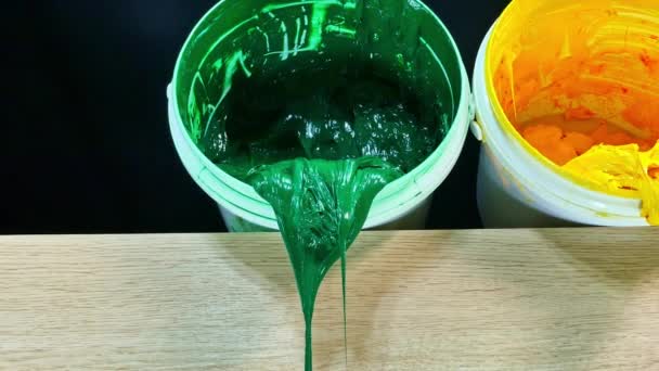 Green Yellow Orange Paints Dripping White Barrel High Quality Video — Stock Video