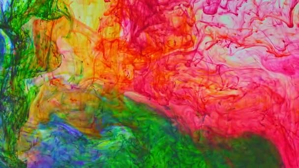 Colored Powder Flakes Dissolved Water Spreads Slowly Mixed Other Colors — Stock Video