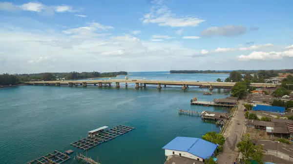 stock image Aerial view of beautiful Sarasin bridge on the blue sea. The bridge connect Phuket to Phang Nga.