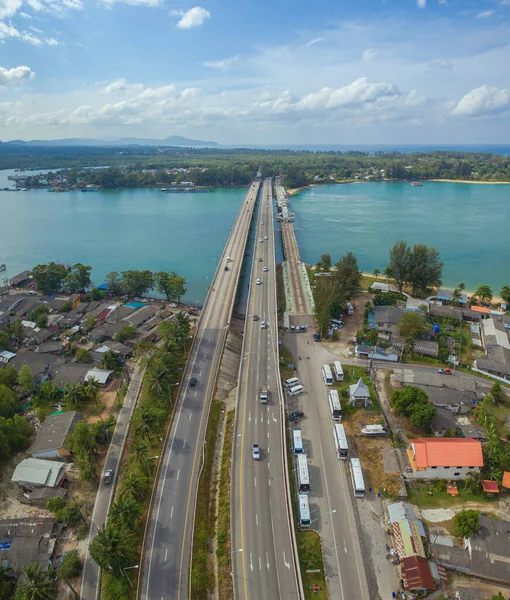 stock image Aerial view of beautiful Sarasin bridge on the blue sea. The bridge connect Phuket to Phang Nga.