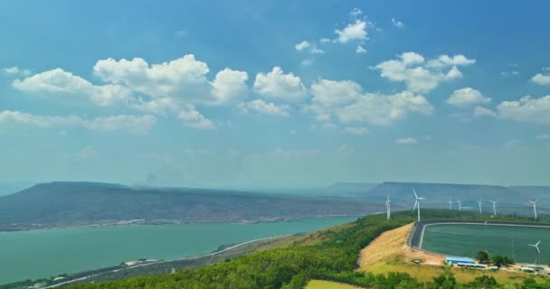 Aerial View White Clouds Float Blue Sky Wind Turbines Mountain — Stock Video