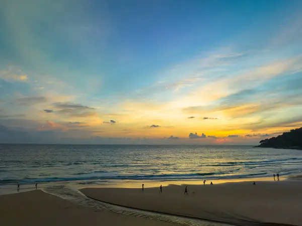 reflection of scenery romantic sky of sunset at Karon beach