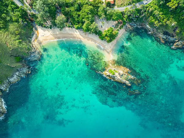 stock image aerial top view above small island in front of Yanui beach in low tide. Sand dunes in the separate sea. Sandbars form in the Separated Sea when the water level goes down. green sea white sand beac