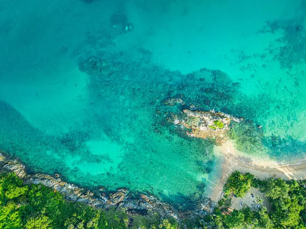 stock image aerial top view above small island in front of Yanui beach in low tide. Sand dunes in the separate sea. Sandbars form in the Separated Sea when the water level goes down. green sea white sand beac