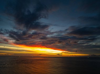 aerial view beautiful sky in sunset at horizon at Kata beach Phuket Thailand. clipart