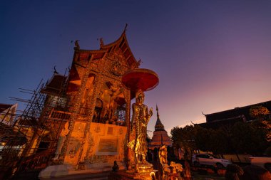 Time lapse Exquisite architecture Wat Buppharam at Thapae road Chiang Mai. Large Buddhist temple complex that has won awards for its architectural preservation.Temples that attract tourists to visit clipart