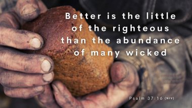 Scripture Verse Psalm 37:16 - A little that a righteous man has is better than the riches of many wicked. A picture of a man with dirty working hands holding a small loaf of bread. clipart