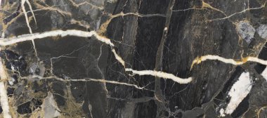 Altın damarlı siyah Portoro mermeri. Kara altından doğal mermer dokusu. Soyut siyah, beyaz, altın ve sarı mermer. Dijital duvar kiremitleri tasarımı için mermer taşın parlak dokusu.