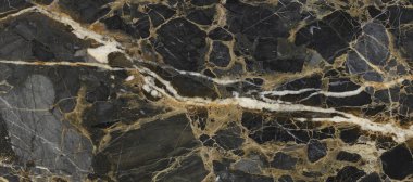 Altın damarlı siyah Portoro mermeri. Kara altından doğal mermer dokusu. Soyut siyah, beyaz, altın ve sarı mermer. Dijital duvar kiremitleri tasarımı için mermer taşın parlak dokusu.