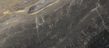 Siyah mermer arka planda desenli. Koyu gri mermer dokusunda altın ve beyaz desenli. Siyah Pietra İtalyan mermer dokusu. Siyah mermer altın desenli lüks. koyu gri.