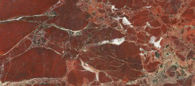 Lüks İtalyan kırmızı taş desenli arka plan. Güzel yumuşak mineral damarları olan kırmızı taş dokusu. arka plan için koyu kırmızı mermer doğal desen, egzotik soyut kireç taşı.