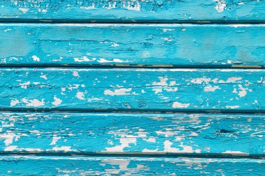 Mavi boyalı ahşap tahtalar. ahşap kalasların dokusu