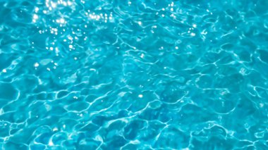 Kristal berrak su yüzeyi dokusu Güneş Işığı Yansımaları ile Arkaplan