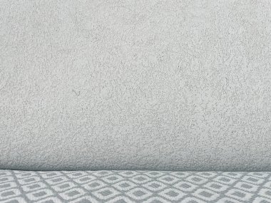 Textured White Wall with Patterned Floor in Foreground, Background for Product Presentation or Banner clipart