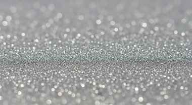 Gümüş parıltılı Noel ışıklarının soyut arkaplanı