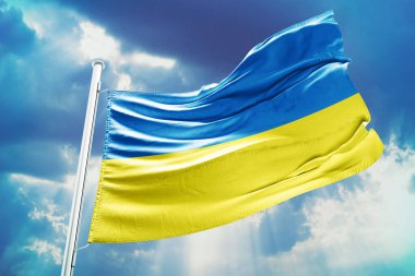 Ukrayna bayrağı gökyüzünde dalgalanıyor, mavi arka plan. 3 d