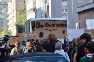 Milano - Lombardy - Italy - October 11, 2024. Fridays for future demonstration in central Milan against climate change. clipart