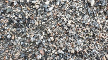 Çakıl dokusu. Ezilmiş çakıl dokusu. Gri taşlar arka plan.