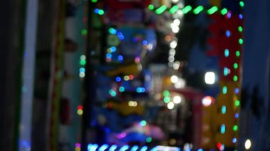 Endonezya 'daki gece pazarı şehrinde ya da pasar malamdaki birçok renge sahip daire bulanık ya da bokeh ışığının bulanık görüntüleri