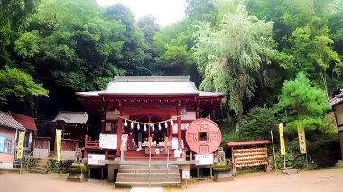 Monument of the Wadokaichin coins at Hijiri Shrine.The oldest currency in Japan, Wadokaichin. In 708, the Imperial Court had an envoy carry a pair of male and female wado scythes, and a celebration was held at Iwaiyama in front of the Wado mine clipart