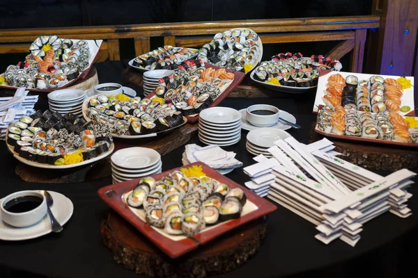 buffet table food buffet fruit with cold dishes assorted meat sushi cold cuts cheeses and sausages various canape pickled products
