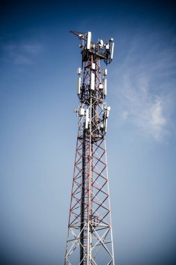 mobile communication tower on blue background