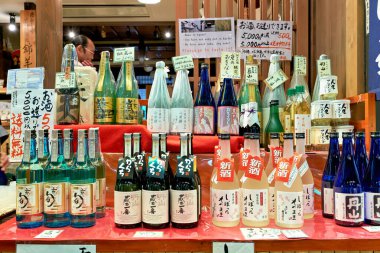 Japan. Kyoto. Nishiki Market. Sake bottles - Date: 28 - 04 - 2023 clipart