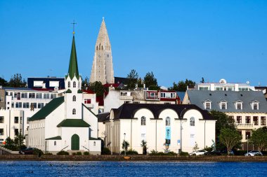 Reykjavik cityscape on lake Tjornin. Iceland - Date: 17 - 07 - 2023 clipart