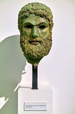 Reggio Calabria. Calabria Italy. The Riace Bronzes at the National Museum of Magna Grecia. Bronze Head. Porticello wreck - Date: 25 - 08 - 2023 clipart