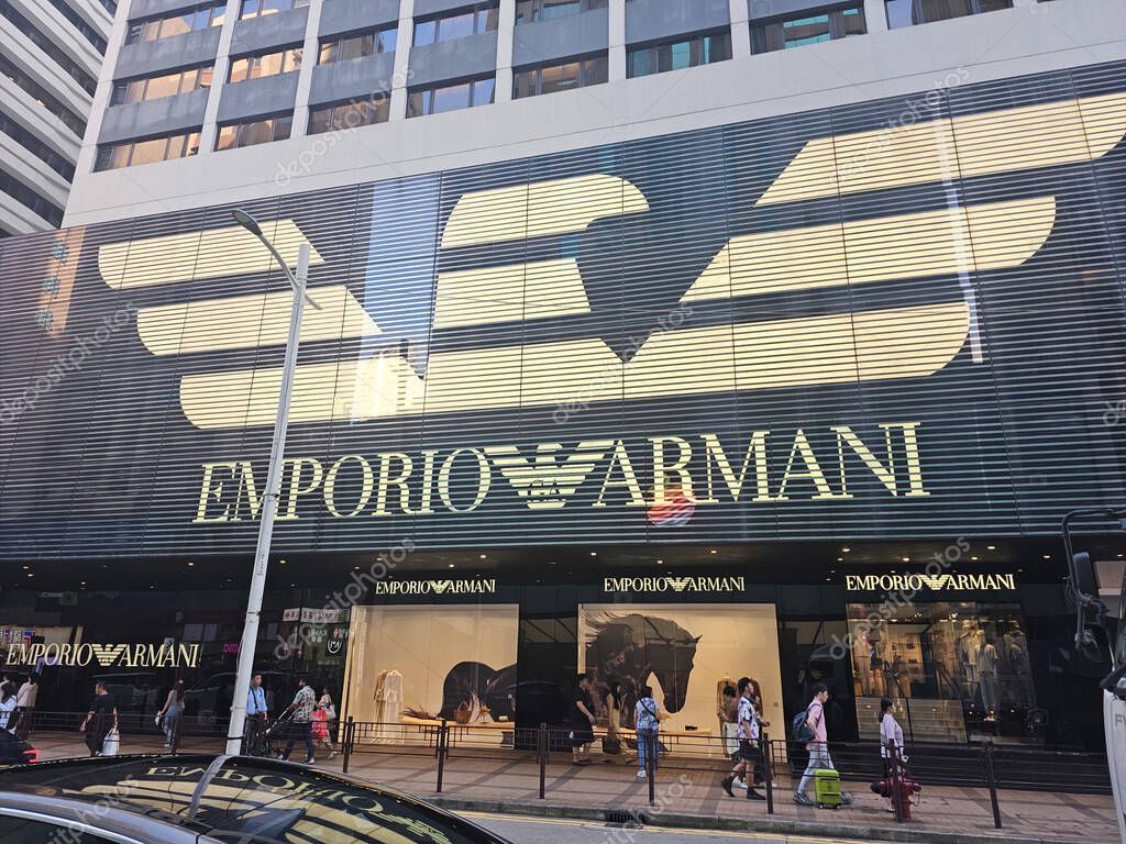 Hong Kong, China - June 6 2025: Luxury Emporio Armani flagship store on Canton Road, Tsim Sha Tsui, showcasing high fashion with its iconic eagle logo and elegant window displays.