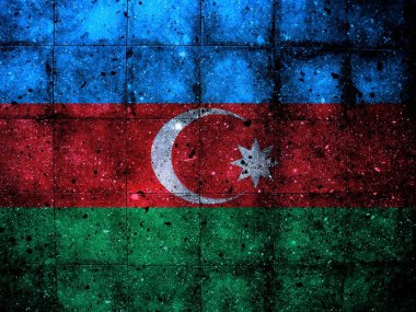 Azerbaycan bayrağıyla boyanmış granit bir duvarın fotoğrafı.