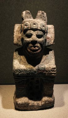 Mexico City 'deki Ulusal Antropoloji Müzesi' ndeki (MNA) Meksika Kültürü galerisinde bulunan Ateş ve Su bileşenlerine sahip bir tanrının heykeli, Xiuhtecuhtli ve Tlaloc,