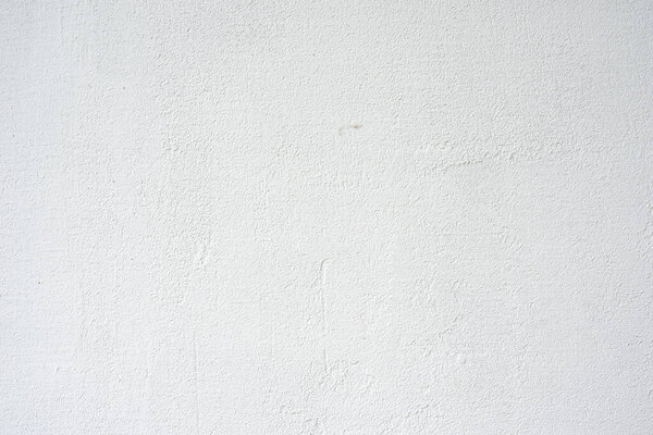 Текстура белой штукатурки с неровностями. Высокое качество фото