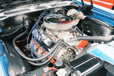 Auburn WA USA, 4 Temmuz 2025 - Klasik bir 4 Temmuz geleneği için klasik ulaşım meraklıları Les Gove Park 'ın antika arabalarına, kamyonlarına ve motosikletlerine hayran kalabilirler