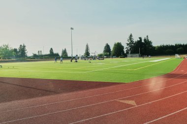 Milton WA USA, July 20, 2025 - Surprise Lake Middle School football field, running tracks on the sports ground