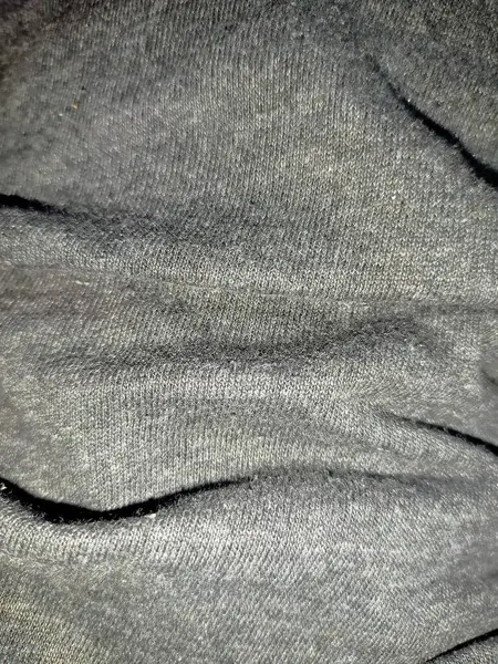 Kalıplı gri kumaşa yakın plan