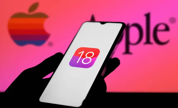 Dhaka, Bangladesh- 05 Apr 2024: Apple IOS 18 icon on smartphone and Apple logo on the background.