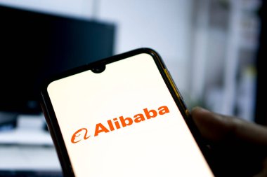 Dhaka,Bangladesh 18 May 2024:Alibaba logo displayed on a smartphone. clipart