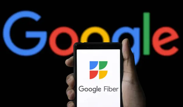 stock image Dhaka,Bangladesh 02 Aug 2024:Google Fiber logo is displayed on a smartphone screen.